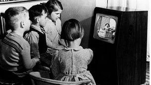 Children watching TV in 1950