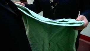 fiona in a prison cell