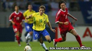 Juninho playing for Brazil in the 2002 World Cup