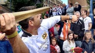 Steve Backley with Olympic torch