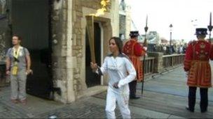 Dame Kelly Holmes with the Olympic torch at Tower Bridge, London