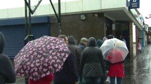 People queuing outside Ulster Bank