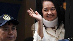 File photo taken on 23 February, 2012 of former Philippine president Gloria Arroyo after appearing in court in Manila