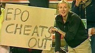 (File photo 2001) Paula Radcliffe holds a sign saying "EPO Cheats Out"