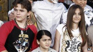 This 26 Jan file photo shows, from left, Prince Jackson, Blanket Jackson and Paris Jackson