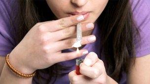 Teenage girl smoking cannabis