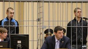 Dmitry Konovalov (L) and Vladislav Kovalyov (R) appear in court over the Minsk Metro bombing