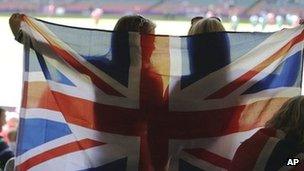 Two Team GB supporters fly the flag at the Millennium Stadium in Cardiff