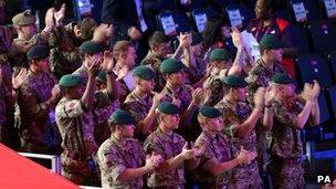 Soldiers clapping at the boxing