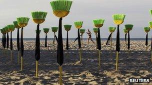 Brooms placed on the beach in a protest at political corruption