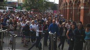 People waiting at St Pancras International station