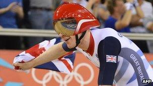 Team GB's Edward Clancy celebrates after winning gold