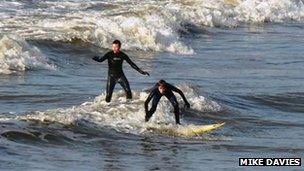 Surfers in Rest Bay, Porthcawl