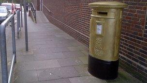 The gold post-box in Harlow