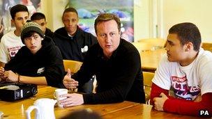 David Cameron speaking to teenagers taking part in an activity camp in mid-Wales