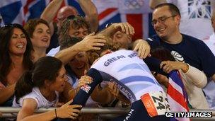 Laura Trott hugs her family