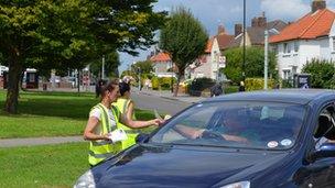 Karon March handing out leaflets