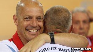 Dave Brailsford hugs coach Shane Sutton at the London 2012 Olympics