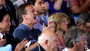 David Cameron cheers on a Team GB boxer