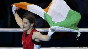 Katie Taylor waves Irish tricolour