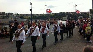 The parade makes makes its way around the city centre