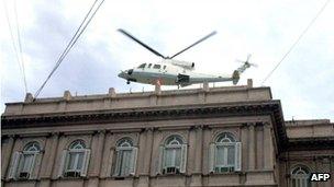 President Fernando de la Rua leaves the Casa Rosada in a helicopter in 2001