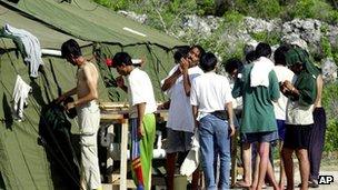 File image of men at asylum camp in Nauru on 21 September 2001