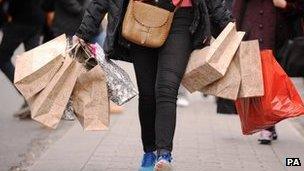 Woman carrying shopping bags