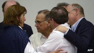 Ecuador's Foreign Minister Ricardo Patino, second right, and South American counterparts