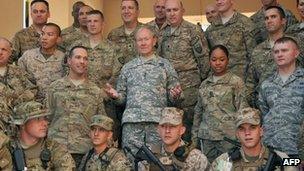 Chairman of the US Joint Chiefs of Staff, General Martin Dempsey (C) poses at the International Security Assistance Force (ISAF) headquarters in Kabul on August 20, 2012