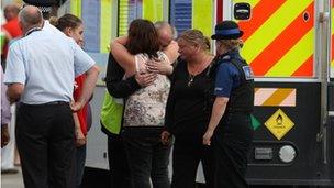 Family members being comforted at Burnham-on-Sea