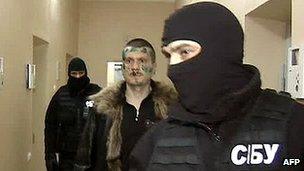 Adam Osmayev under arrest - grab from Russian Channel One TV, 27 Feb 12