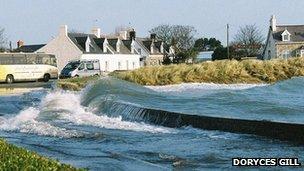 Waves coming over the sea wall at Bordeaux