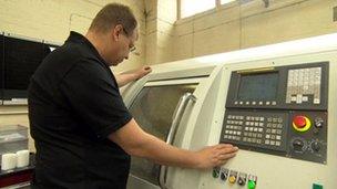 Man operating a machine