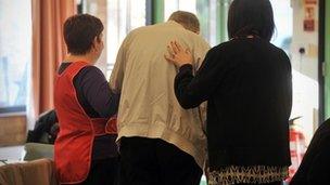 People inside a day centre for the elderly