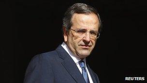 Greek Prime Minister Antonis Samaras waits to meet Eurogroup Chairman Jean-Claude Juncker in Athens, 22 August