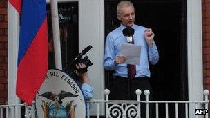 Julian Assange speaks on the balcony of Ecuador's UK embassy