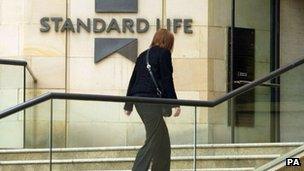 Woman walking into Standard Life building