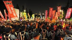 Protesters hold rally against start of nuclear reactors in Japan