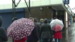 People queuing outside Ulster Bank