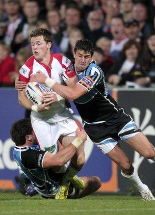 Ulster's Craig Gilroy is tackled by Glasgow's Alex Dunbar and Peter Murchie