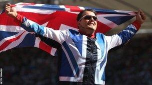 Aled Davies celebrates his shot put bronze medal