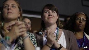 Women listen to Michelle Obama the the Democratic National Convention