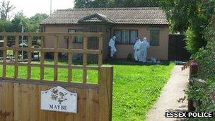 Forensics officers at the scene of the Crays Hill shootings