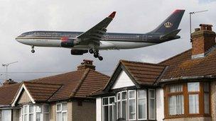 A plane flying over west London