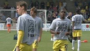 iLIVEiGIVE T-shirts worn by Torquay United players