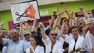 Public health workers take part in a protest against government austerity measures in Oviedo, northern Spain September 7