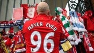 Liverpool fan pays his respects to those who died in the Hillsborough disaster