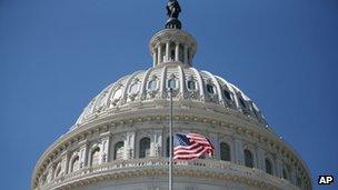 The American flag stands at half-staff at the US Capitol in memory of the US ambassador to Libya killed in Benghazi