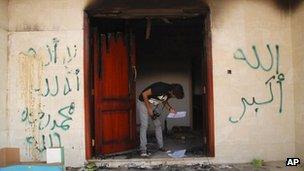 Graffiti on the bombed US consulate in the Libyan city of Benghazi